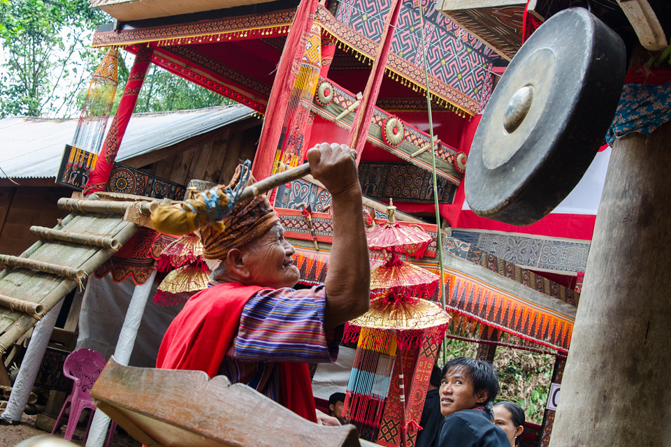 In Indonesia's Tana Toraja, it is traditionally believed that death is not a sudden, dreaded event, but a gradual process toward Puya, the land of souls or afterlife.  When a death occurs, the community comes together at the sound of a gong to do what they can to guide the deceased to their ancestors in the afterlife.