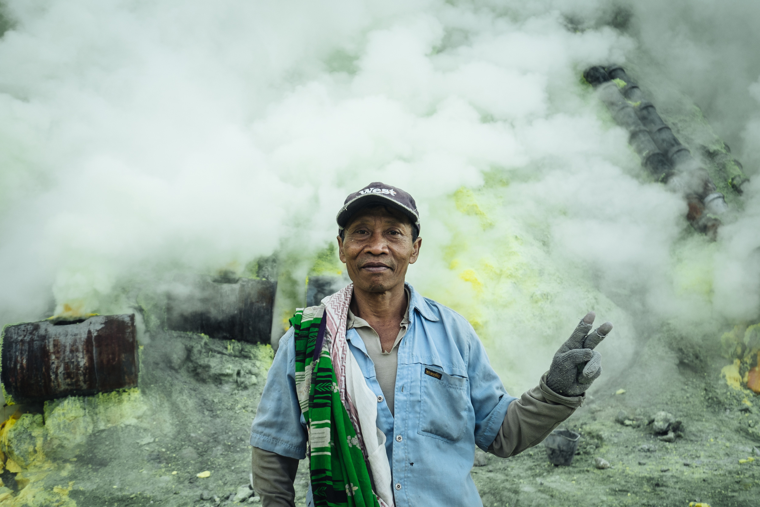 Each day the miners from surrounding areas make the perilous journey up to the rim of East Java's Ijen volcano before descending into the depths of one of the most poisonous places on the planet. Here lies one the world's largest sulphur mines.