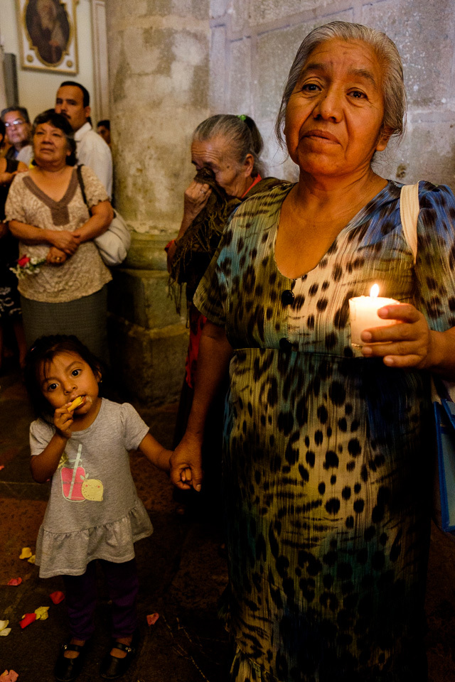 The day of the dead in Oaxaca, starts one week before with several religious ceremonies. This woman was leaving the church after the starting processins for the celebrations.