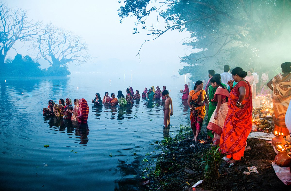 When the sun is almost due, most of the devotees are submerged.