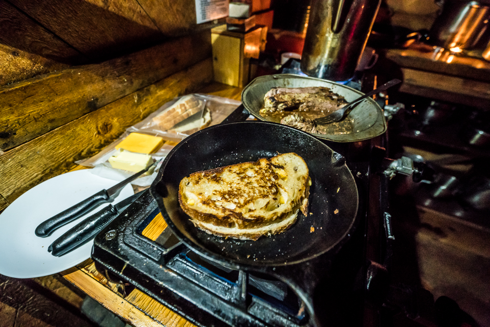 After a long day of skiing, simple meals like grilled cheese and steak help satisfy and refuel.