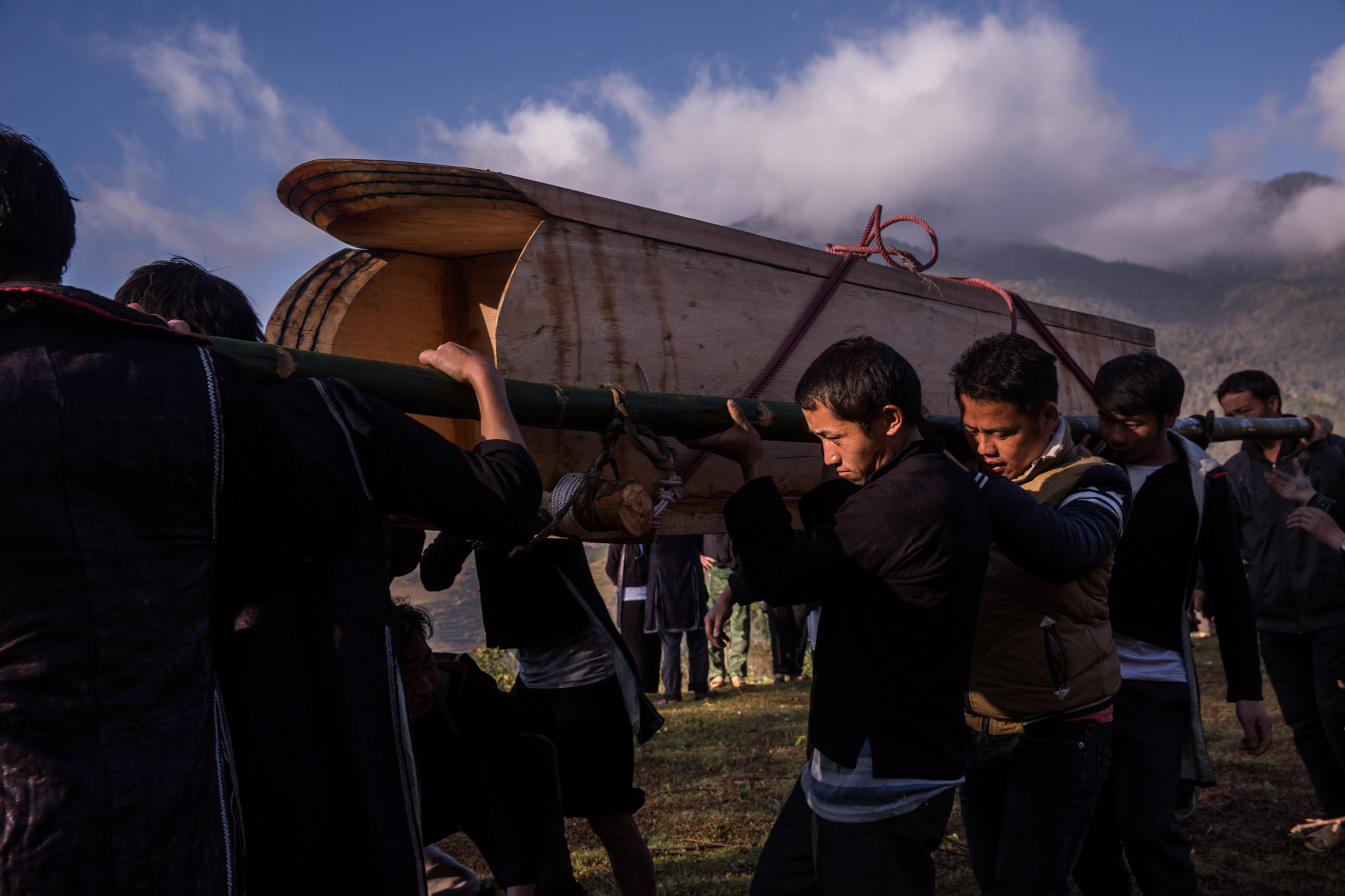 The body of the deceased is carried around the mountain while the sound of a musical instrument sounds during its journey.