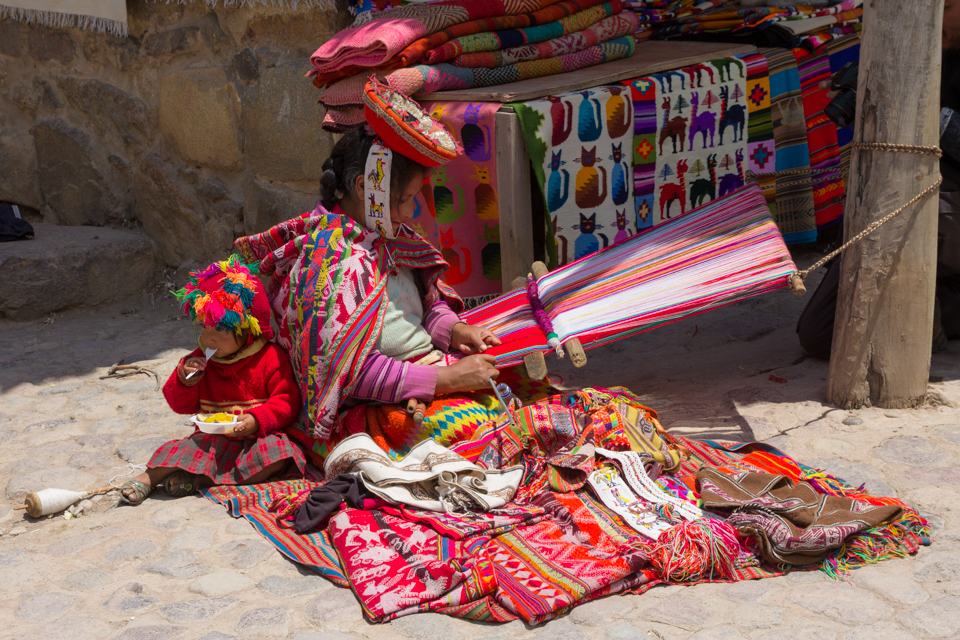 In the touristy little town of Ollantaytambo, Peru, many people are passing through. While tourism has certainly allowed the town to grow and become more westernized, it also has helped keep traditions alive, even if just for the sake of tourists.