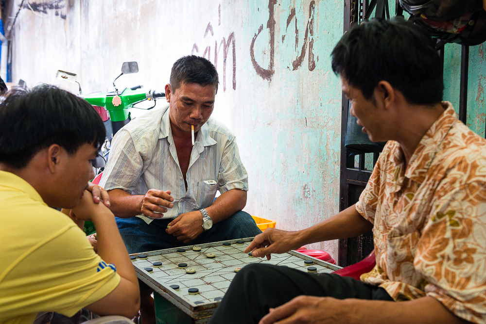 Taking a break during a long day for a game of Xiangqi and a cigarette