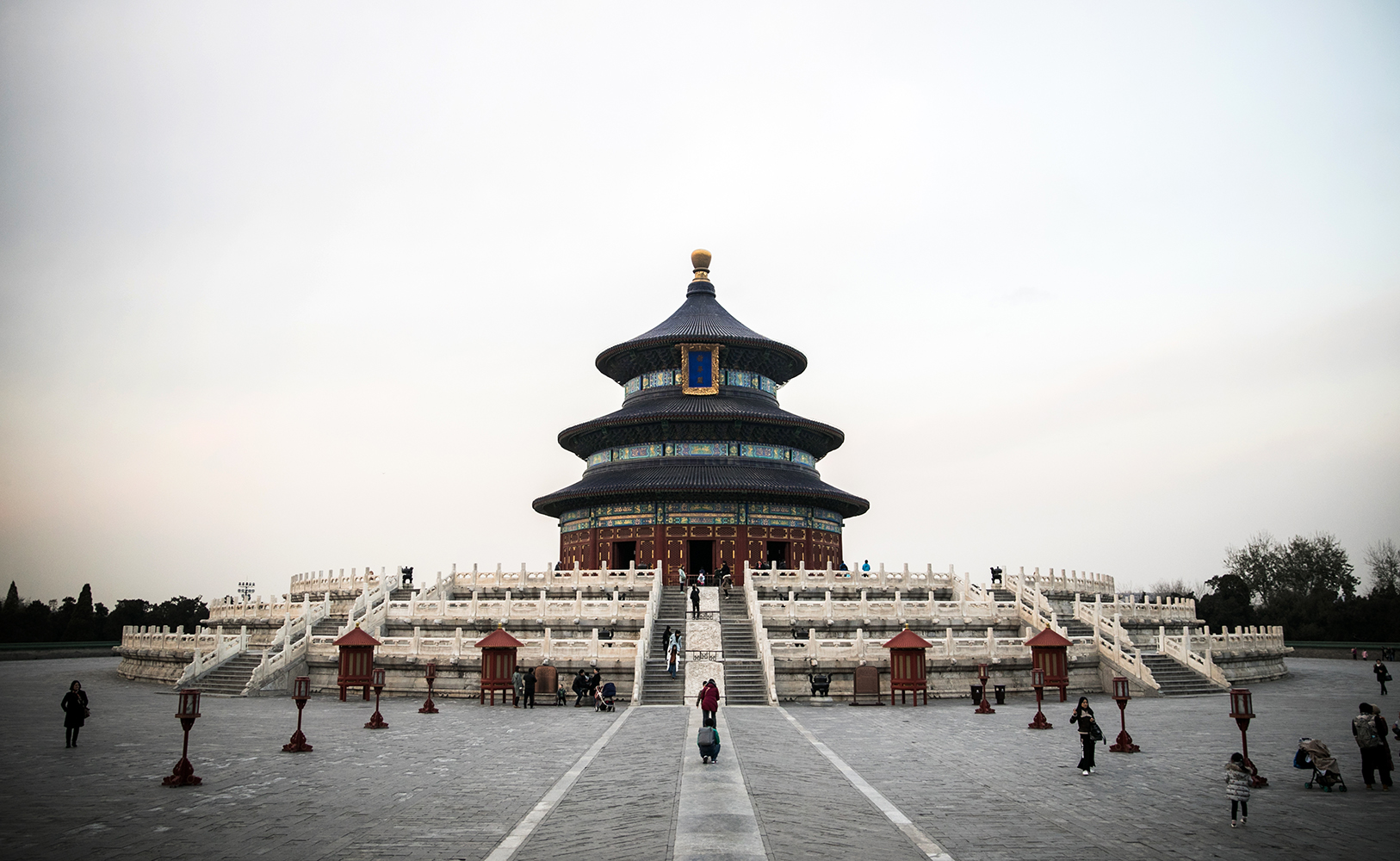The Temple of Heaven in Beijing, China, where hundreds of tourist gather each year to see the spectacular buildings on the grounds. The park just outside, however, is a very popular place to play "Xiangqi", which is Chinese chess.