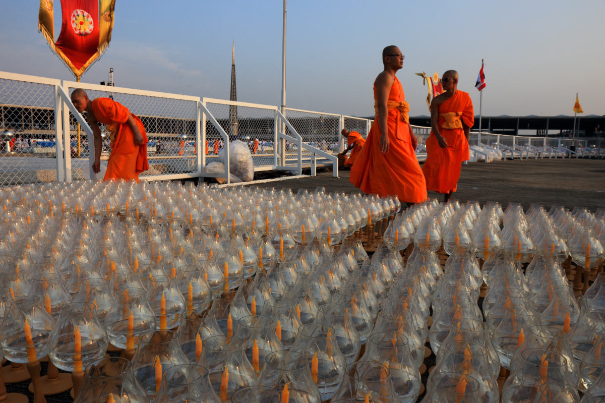 Preparing 100,000 votive candles for the Makha Bucha - The second most important Buddhist festival in Thailand.