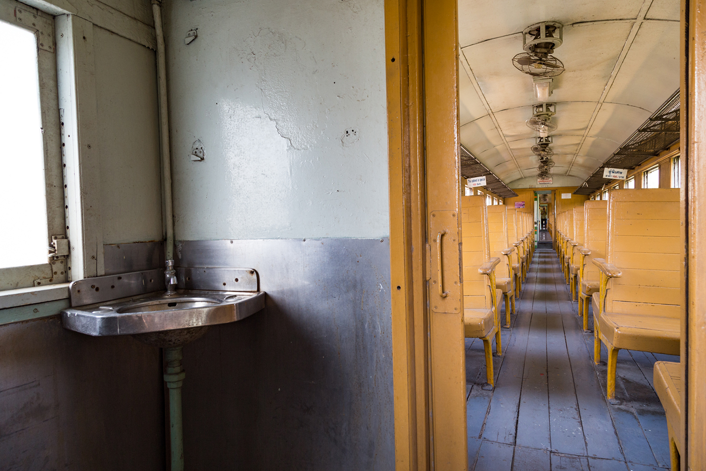 Though sober, spartan even, and very reminiscent of WWII, the austere interior of the III class train looked authentic, clean and was anything but uncomfortable. The 2-hour scenic route to Tham Krasae Railway Station was indeed a rare delight.