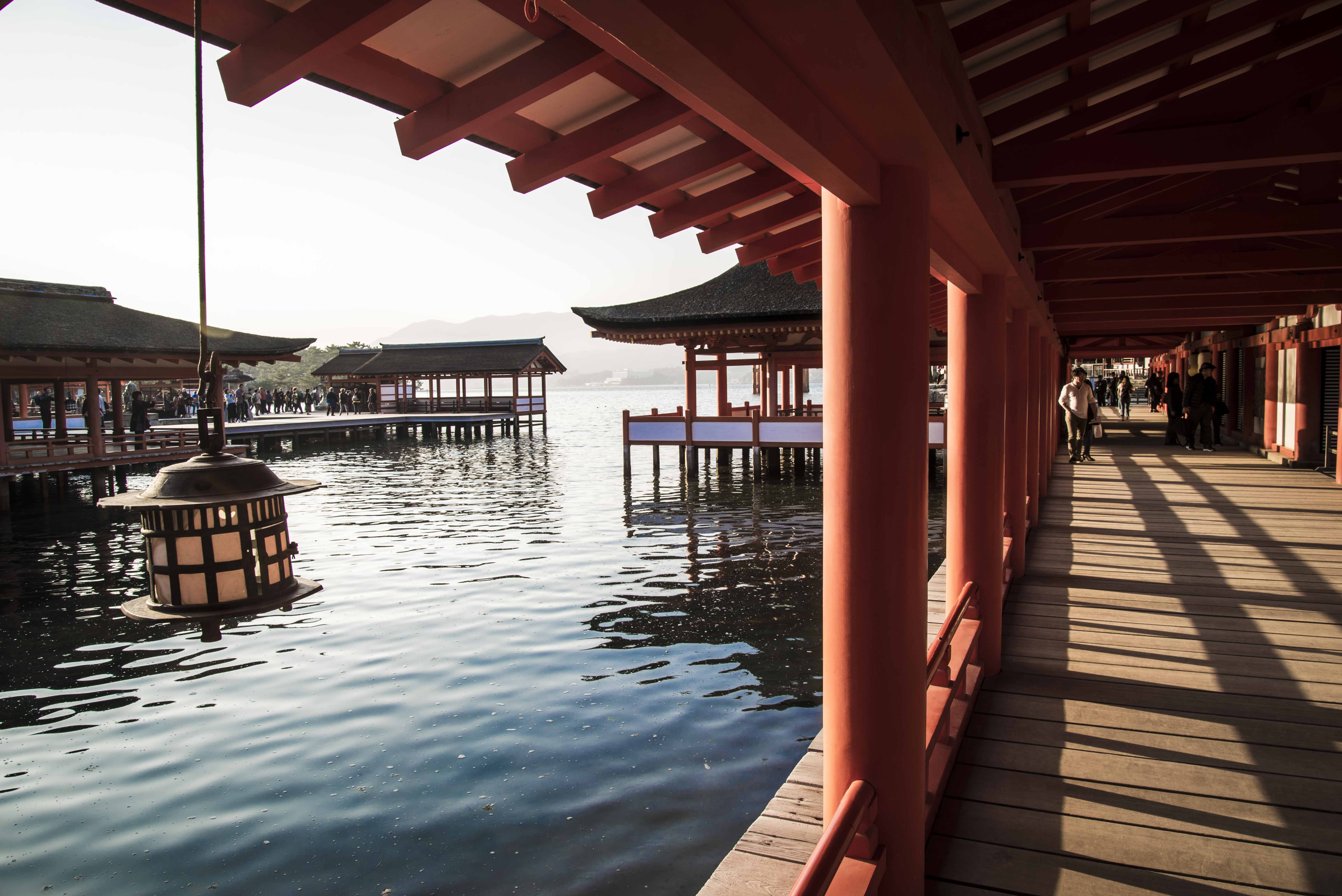 Itsukushima Shrine floats over the bay on stilts, containing over 1400 years of history.