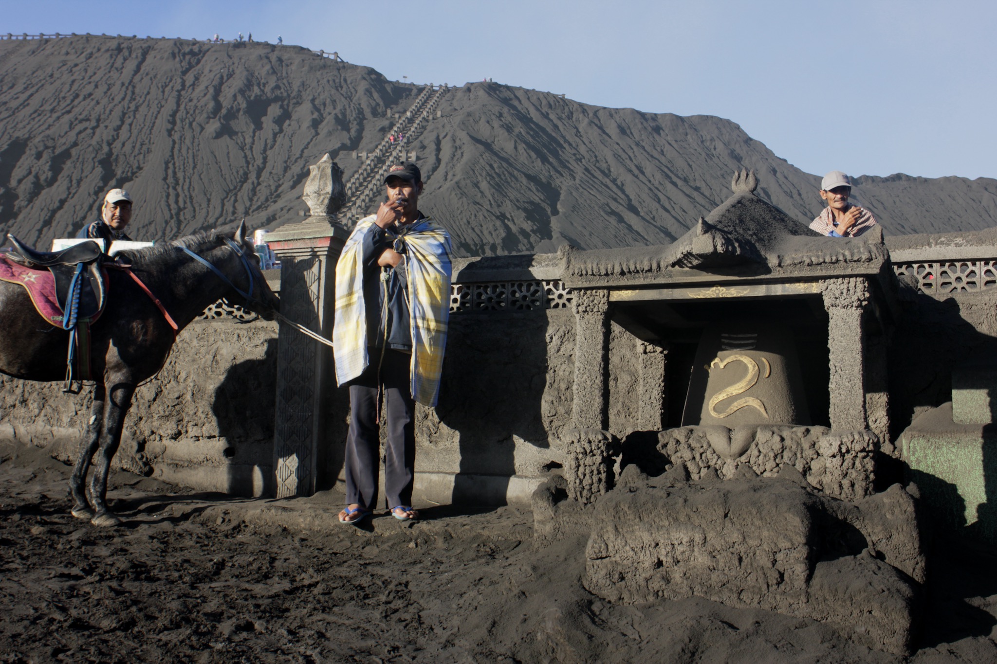 The area is inhabited by the Tengger people believed to be driven into hills after mass arrival of Madurese Muslim in the 19thcentury, one of the few significant Hindu communities remaining on the island of Java(In frame: Villagers enjoying sunrise while waiting for tourist for horse rides)