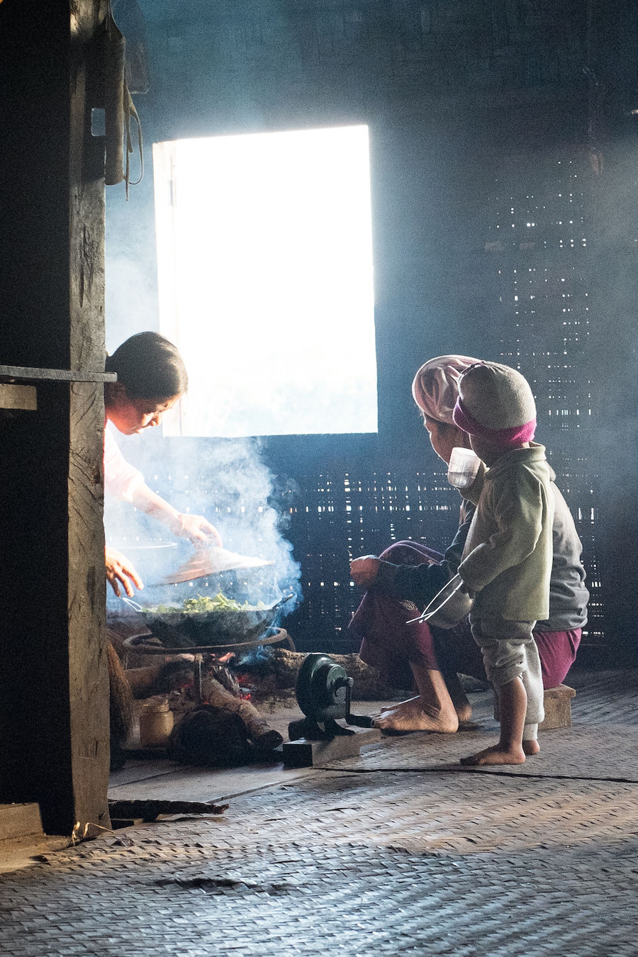 A family cooks breakfast. Most meals consist of home grown vegetables.