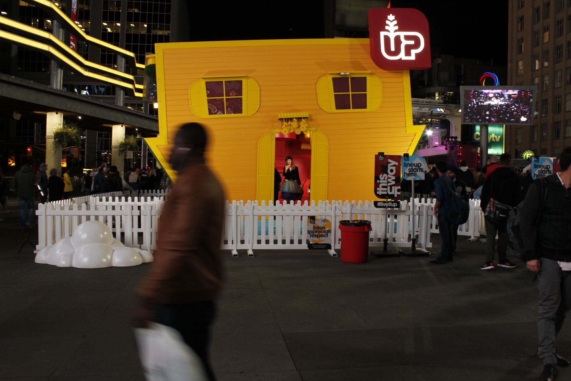 In Dundas Square a house has started a revolution. Decided to stand up by going upside down.