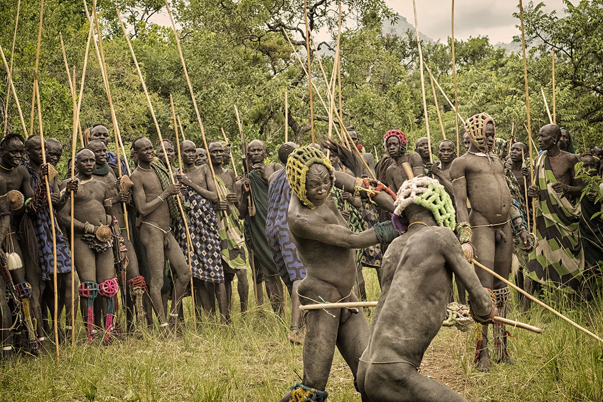 'Donga' - A traditional form of Suri stick fighting. Two men from opposite clans with beat each other mercilessly until the other yields. Donga is an opportunity for women who are looking to get married to scout out a potential husband. 