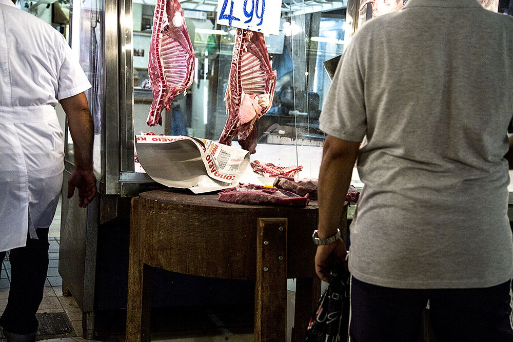 There are a lot of meat stalls inside the market. Most of them sell lamb, which when they are sold are wrapped in newspaper. There is always a lot of movement inside this traditional place.