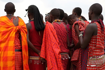 Masai - Tribesmen at their village on the Mara, always in their brightly coloured shuka blankets