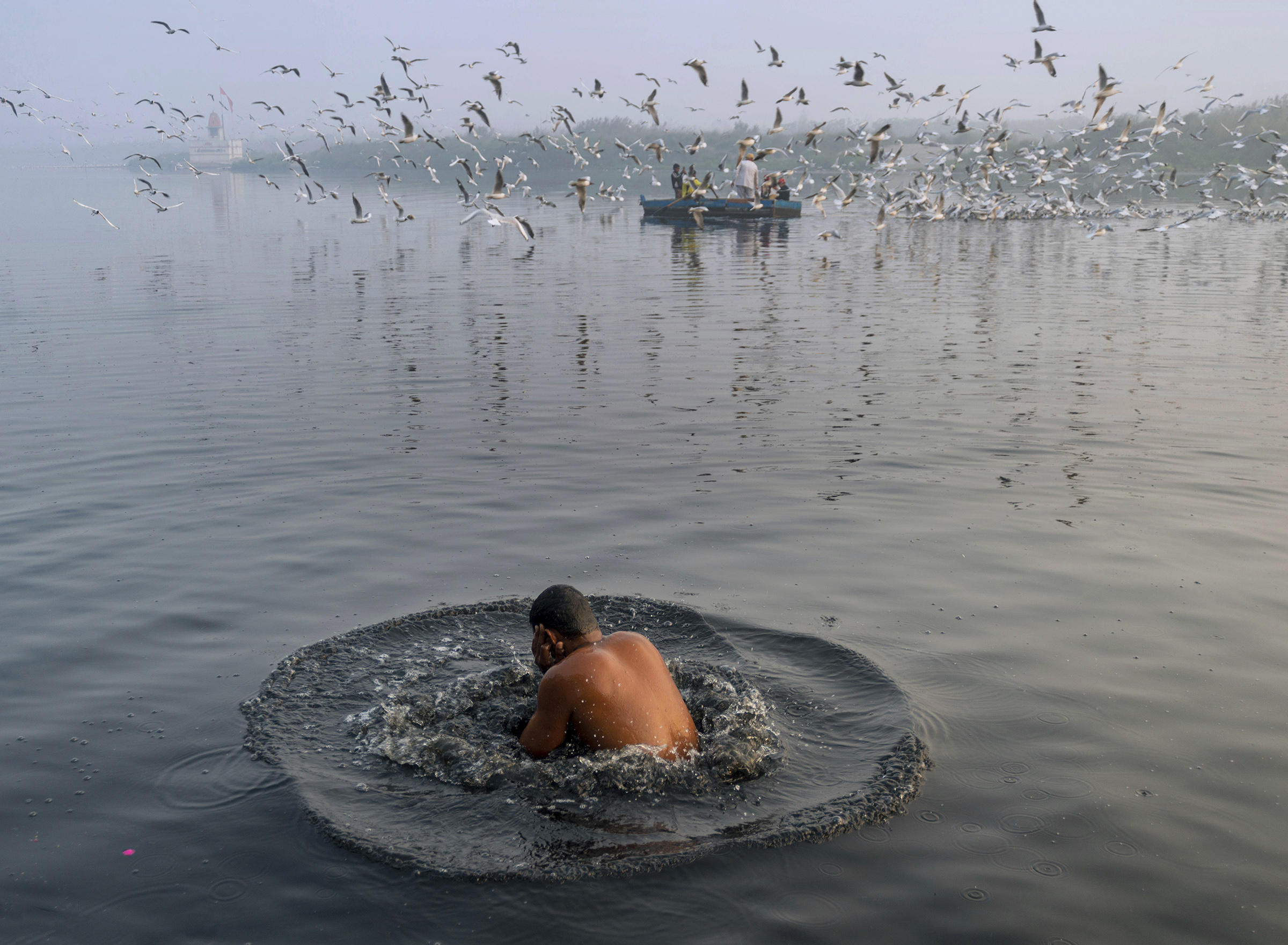 In Hindu mythology just taking a dip in Yamuna’s holy waters is considered to rid you of your sins. A devotee takes a dip in the water despite the fact that the river also doubles as a sewage dump for the city’s waste. This offers an insight into the place it has in people’s heart.