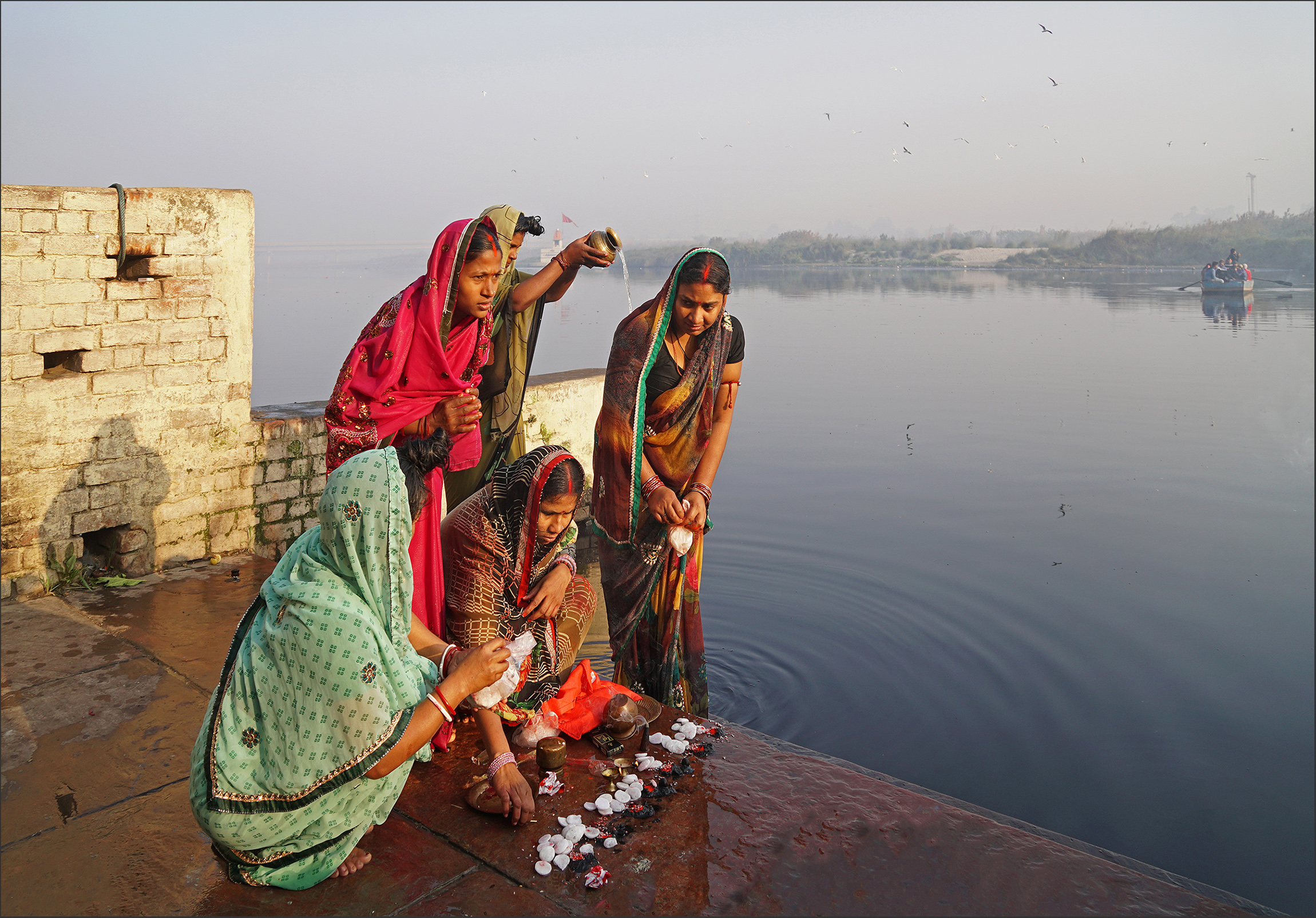 On the auspicious occasion of Makar Sankranti, the Hindu New year, women perform the festival rituals after taking a dip in the river at the banks in Delhi. All orthodox devotees have continued these traditions for ages and still continue despite the river’s grim conditions.