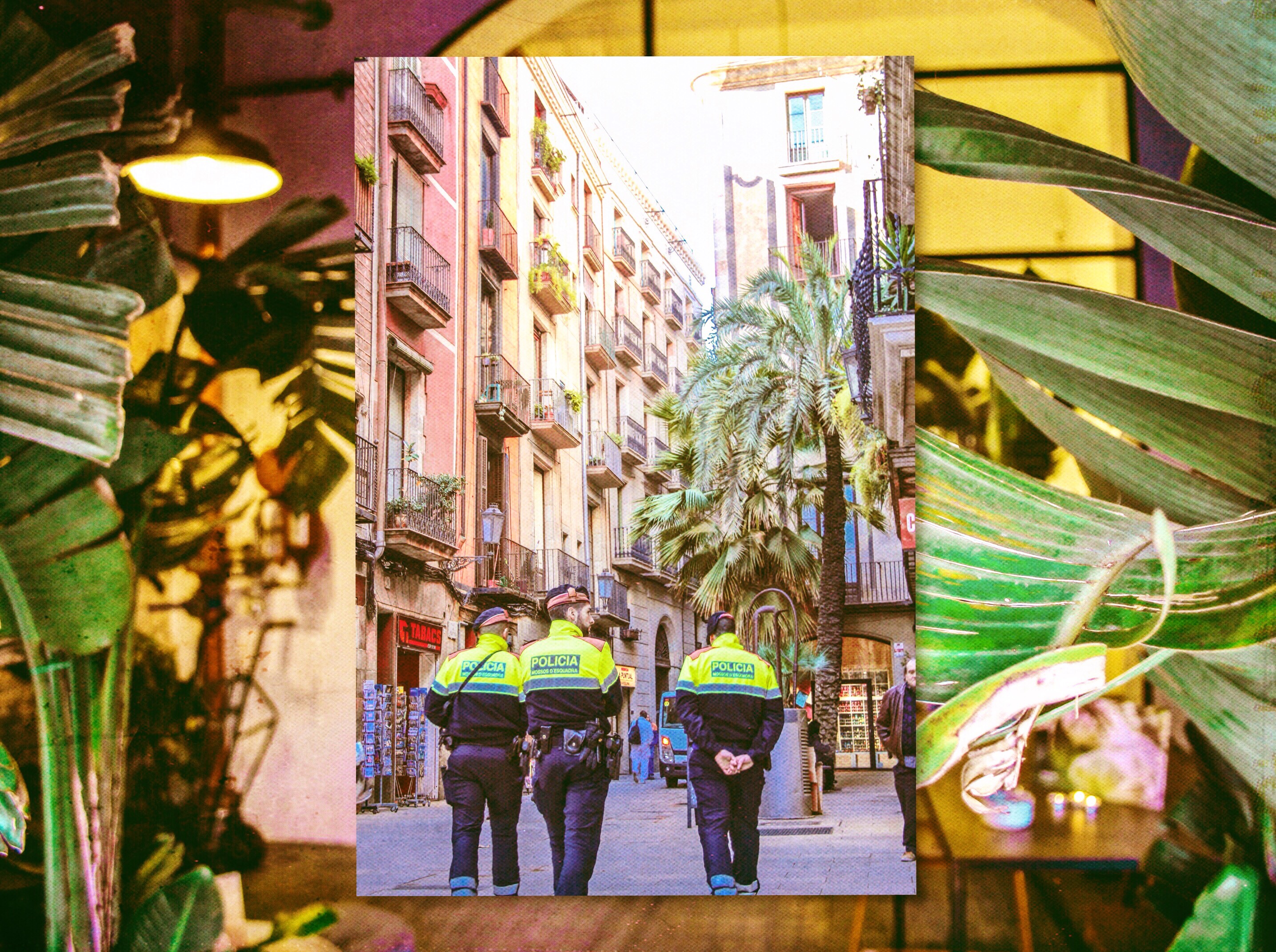 Policia - The palm trees and the bright colors all over Barcelona creates a serene atmosphere, even the police officers' uniforms compliment their surroundings. 