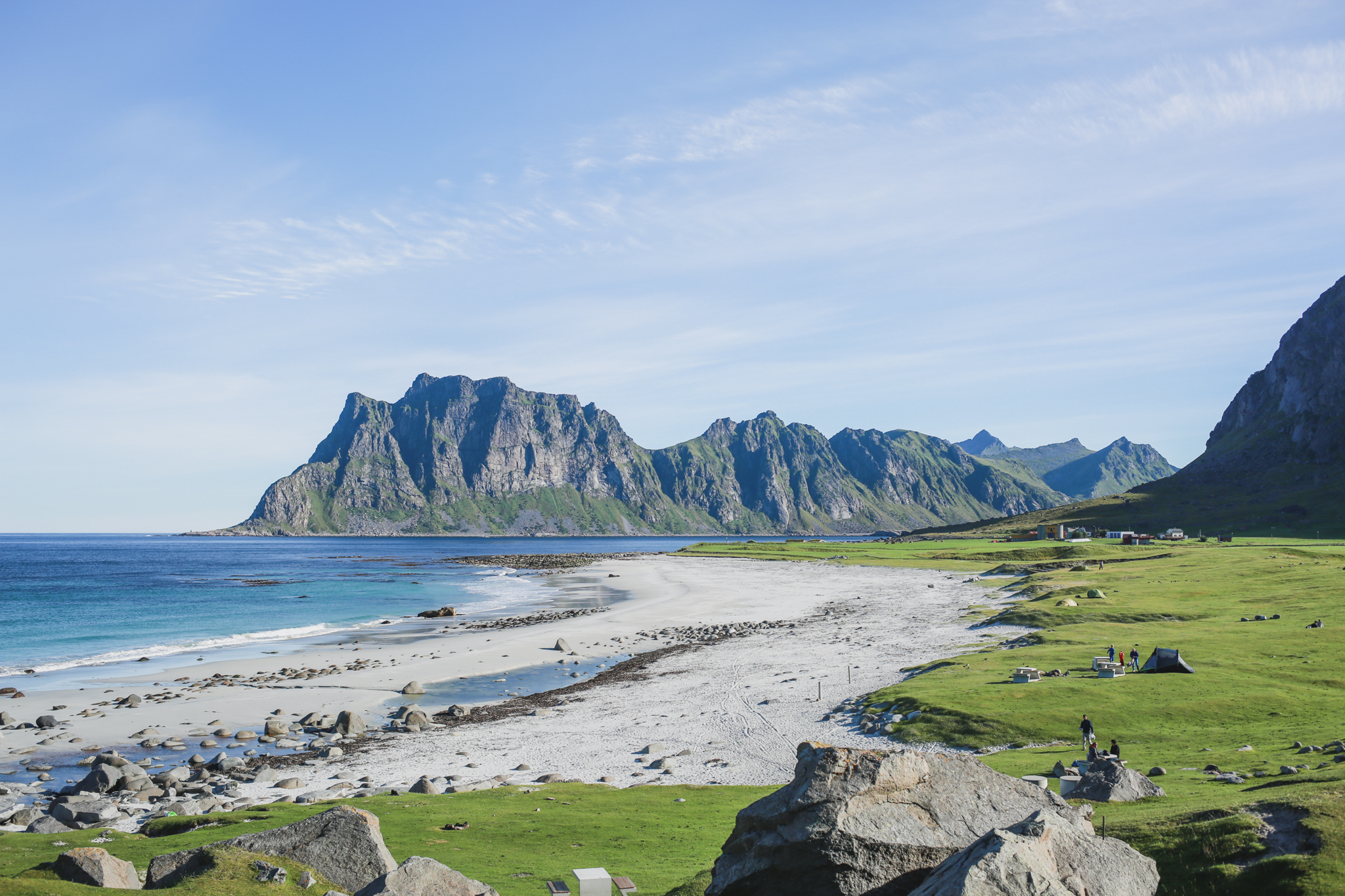 White sand beaches, lush green farmland and dramatic granite peaks that plunge into the Norwegian sea set the scene.
