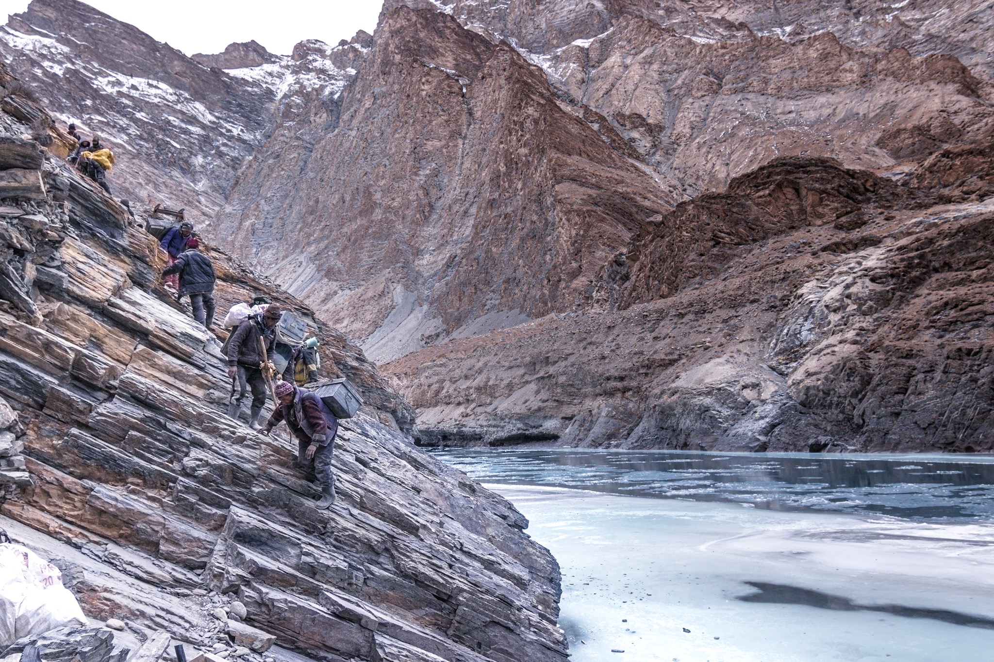 The chadar thaws at temperatures above -18C. As the ice opens up, travelers have to climb gorge walls polished smooth by millennia of summer erosion