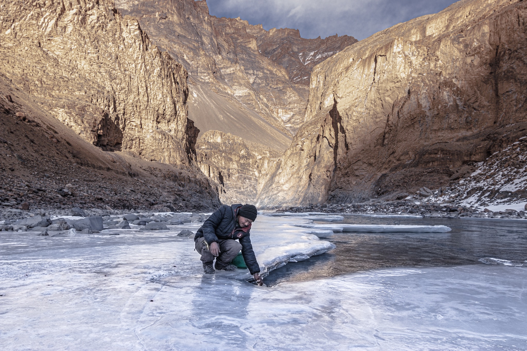 The greatest irony on the chadar is the lack of water to drink. Here, Sonam lays himself down on a sheet of ice to make the most of the thaw