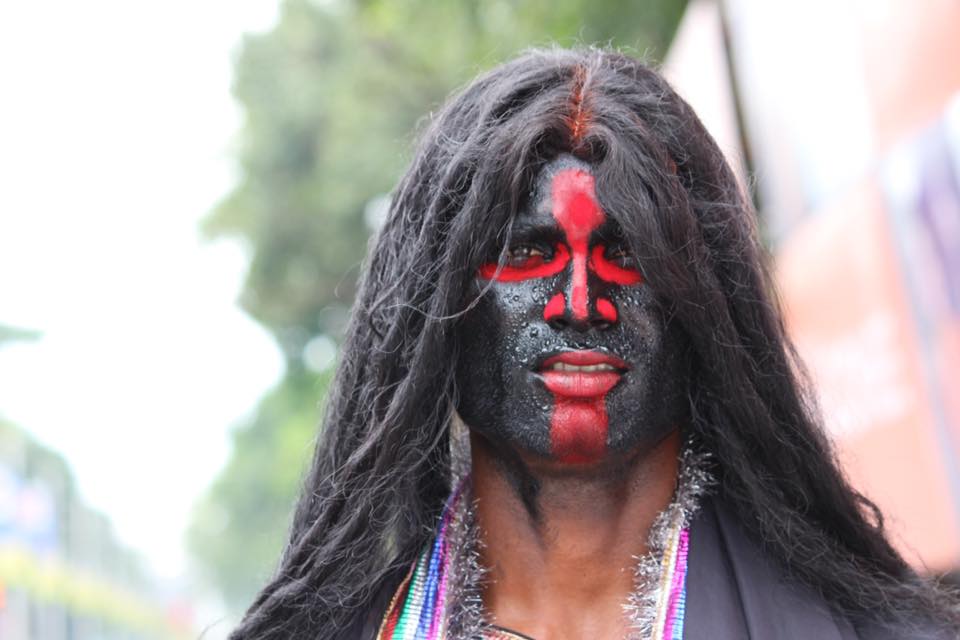 Colours of belief - This man dressed as Goddess 'Kali', is roaming around the city, the passerby's are joining hands and showing respect to him. He is just enacting but his act clearly depicts Power, Believe and Hope still persists.