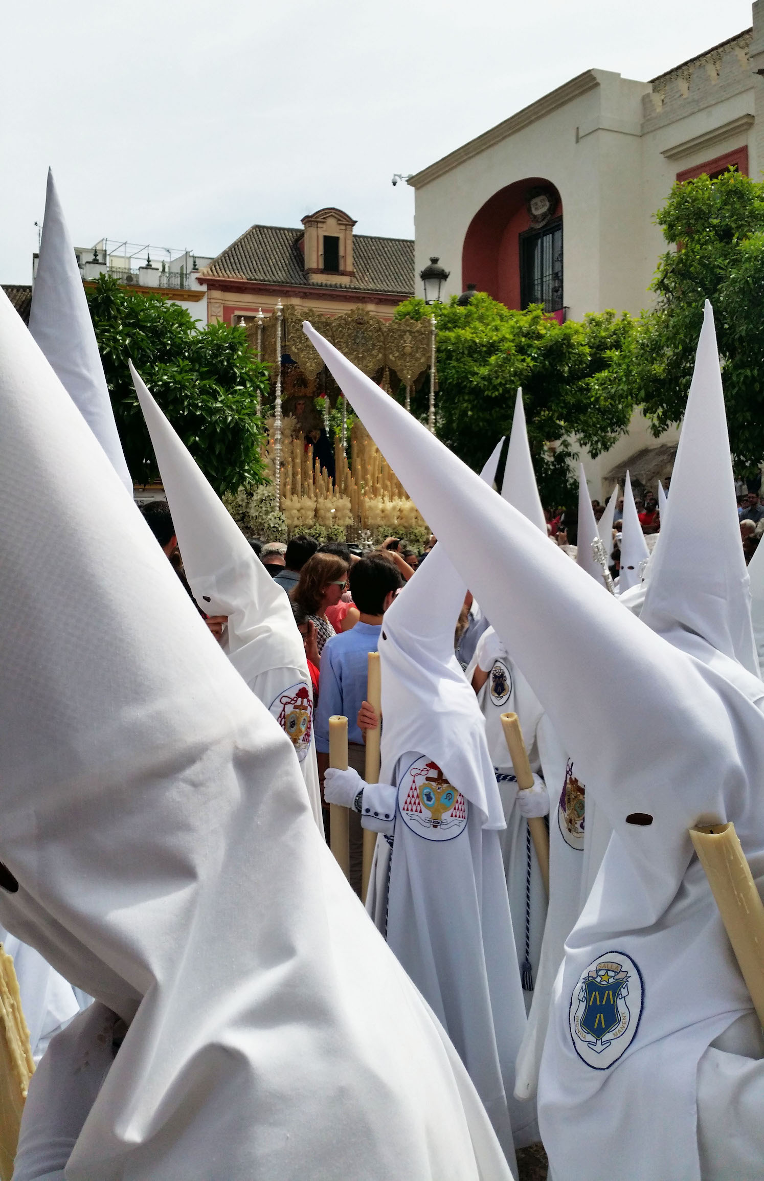 Also known as ‘penance processions’ they dress in traditional capirote, which used to be for people doing penance: as a sign of atoning their sins, they would walk through the town wearing the hat, their faces covered so they could not be recognised as sinners. 
