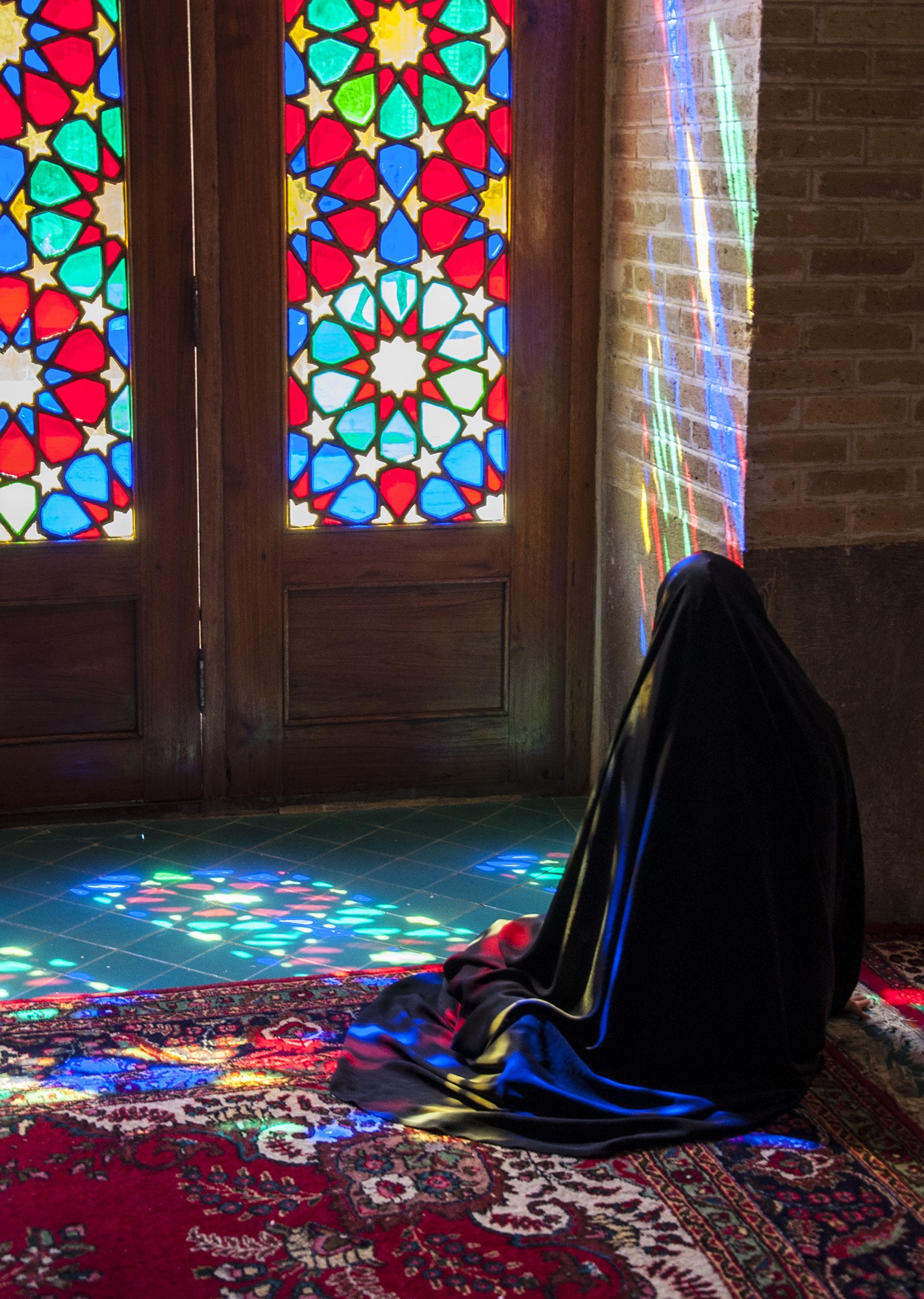 SHIRAZ - Magnificent stained-glass windows conceal the strenght of devotion
