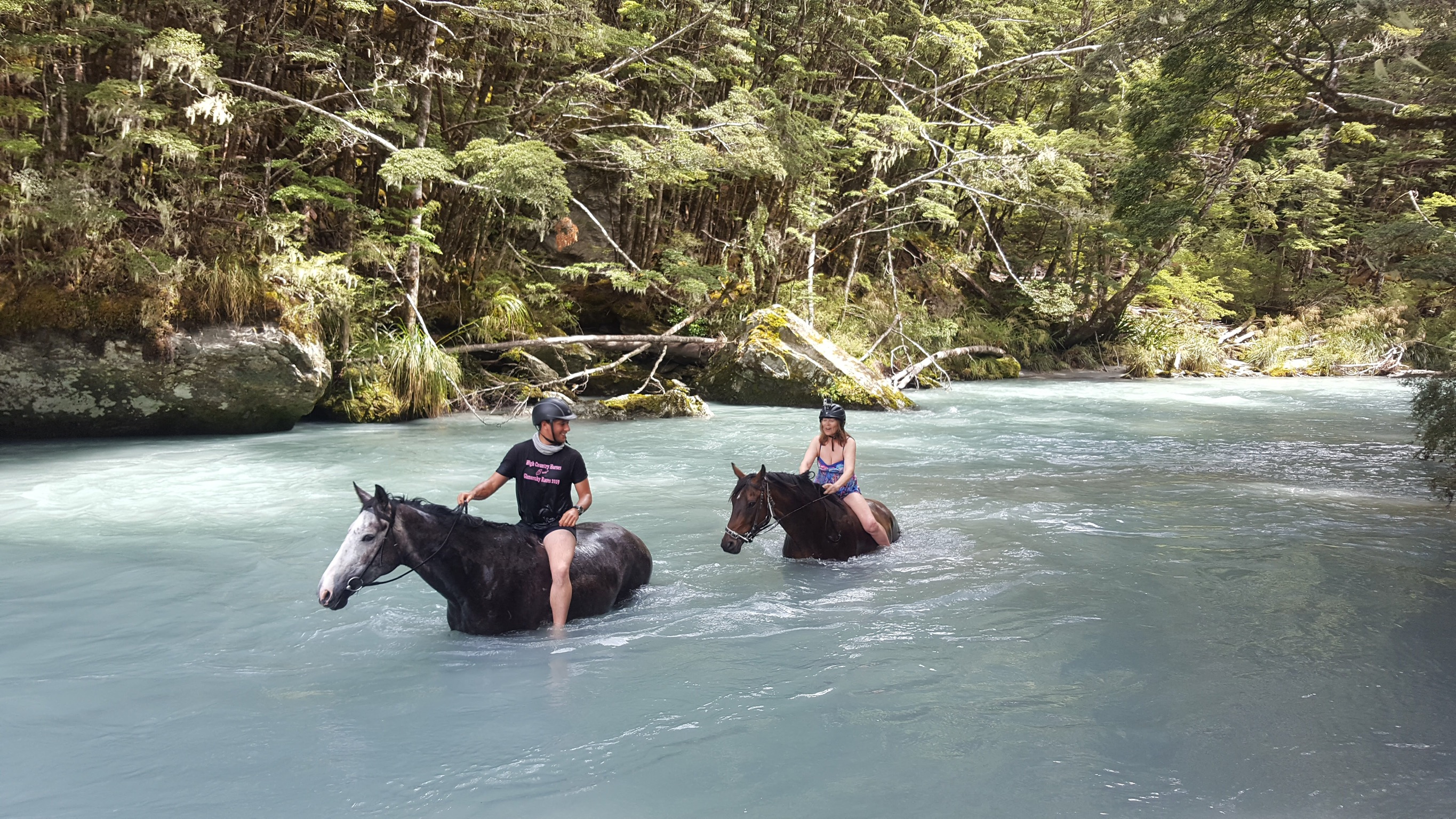 Swimming bareback in glacier waters. It was an amazing feeling having a horse float underneath me in the freezing cold water.