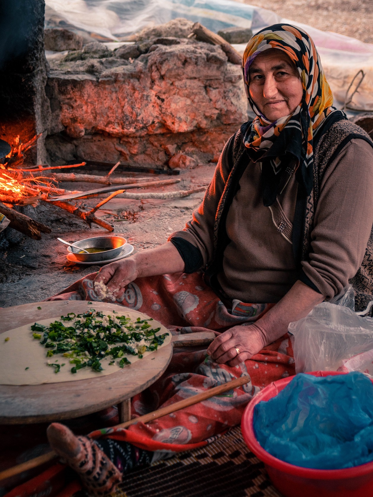 As one moves towards the shores, trade, travel, and tourism have brought exposure, and wealth, to the communities. This influx of resources and ideas have laid the foundations of new ideas, cultures, and the beginnings of leftism and liberalism. Woman vendor near Antalya.