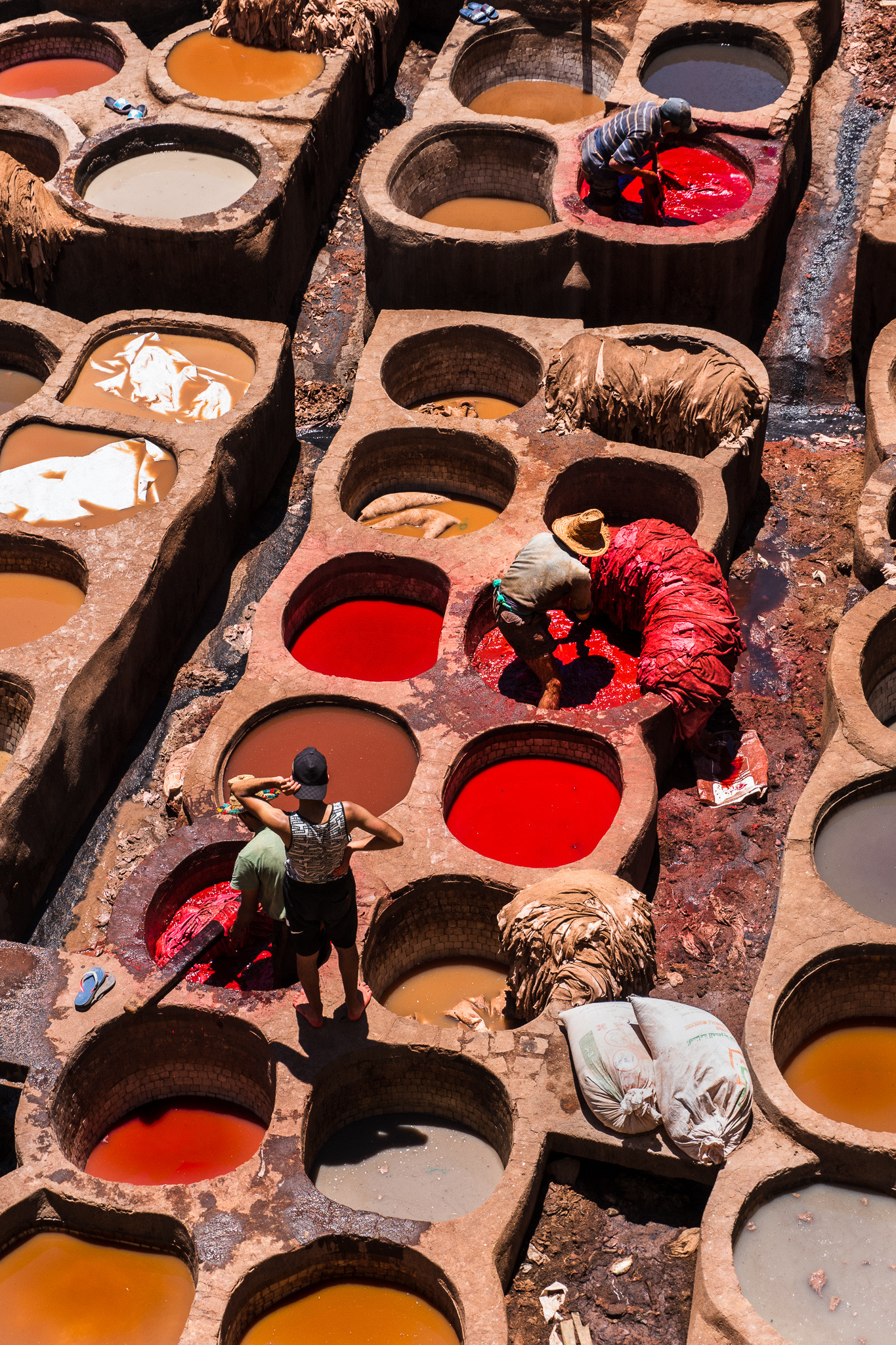 DAY 1
Many People work in Leather Tanneries at 2 pm in Fès, soaking the hides in natural dying solutions.
