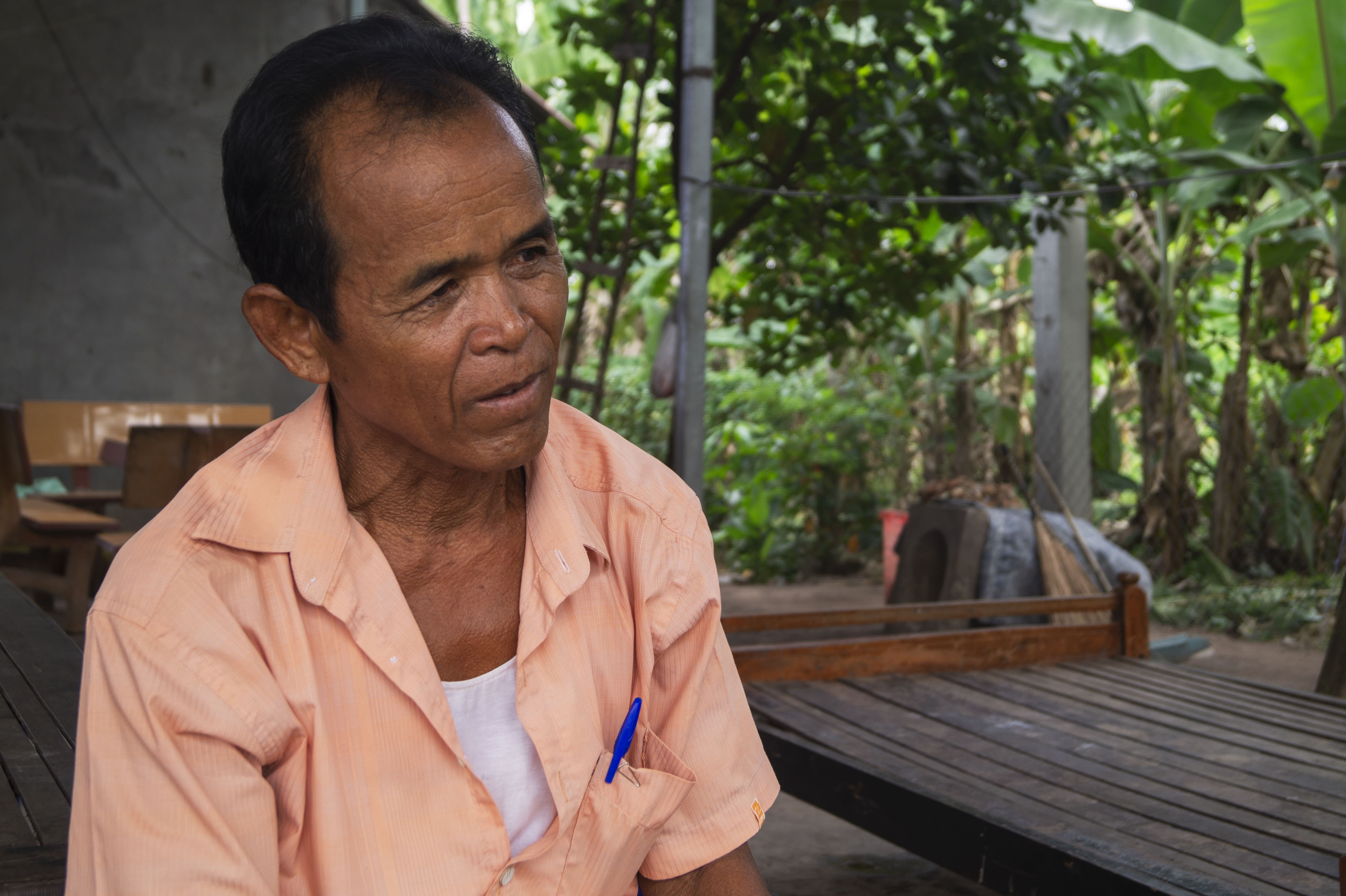 Thon Bun became deputy chief of Kampout Tuk village in 1991 before being "elected" as the chief in 2017. He remembers in 1970 being exposed to a powder, presumably Agent Orange, that felt “as if someone rubbed chili in your eyes.”