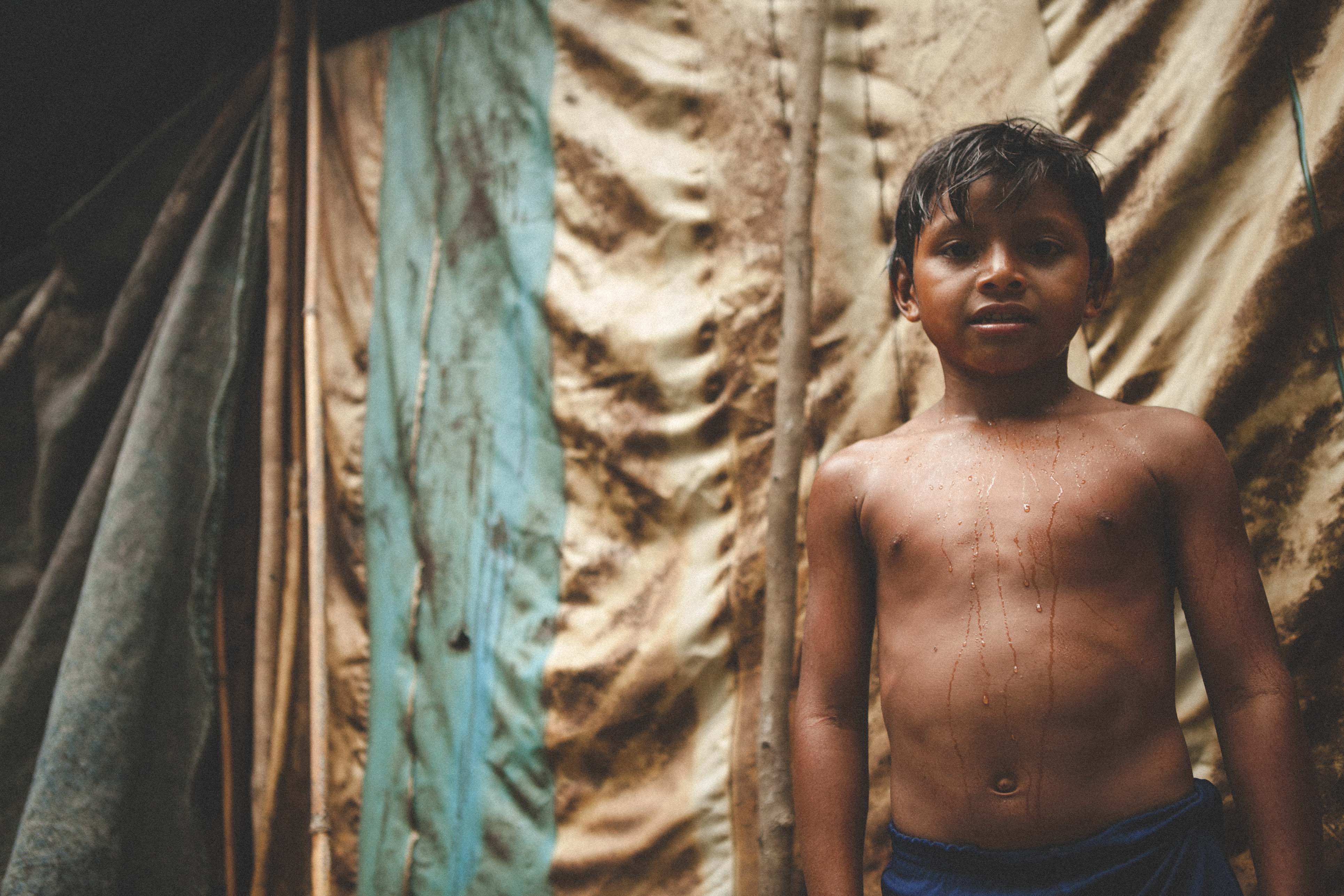 Little boy from a Indigenous tribe, in Paraná State, that are being forced to leave their homeland.