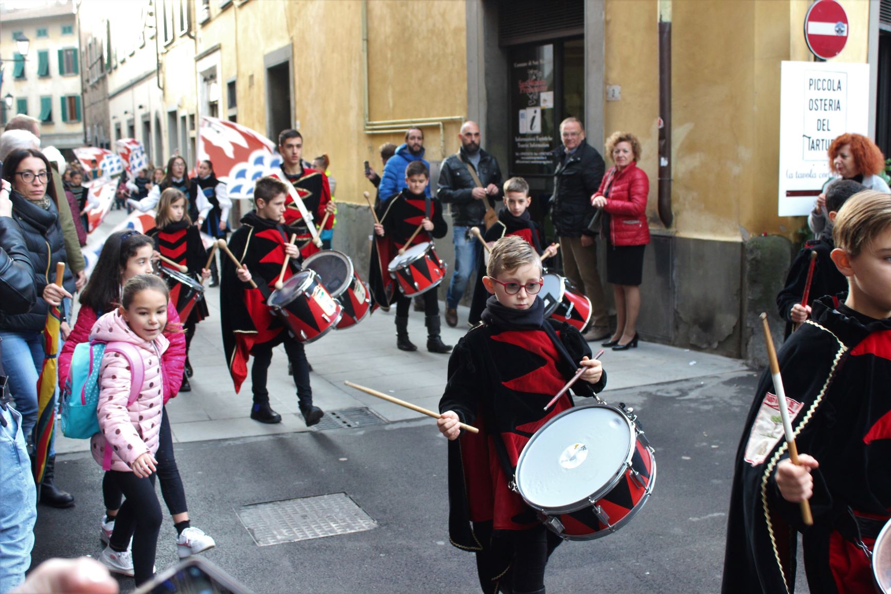 Local children participate in a parade in San Miniato, home to the annual San Miniato Truffle Market.