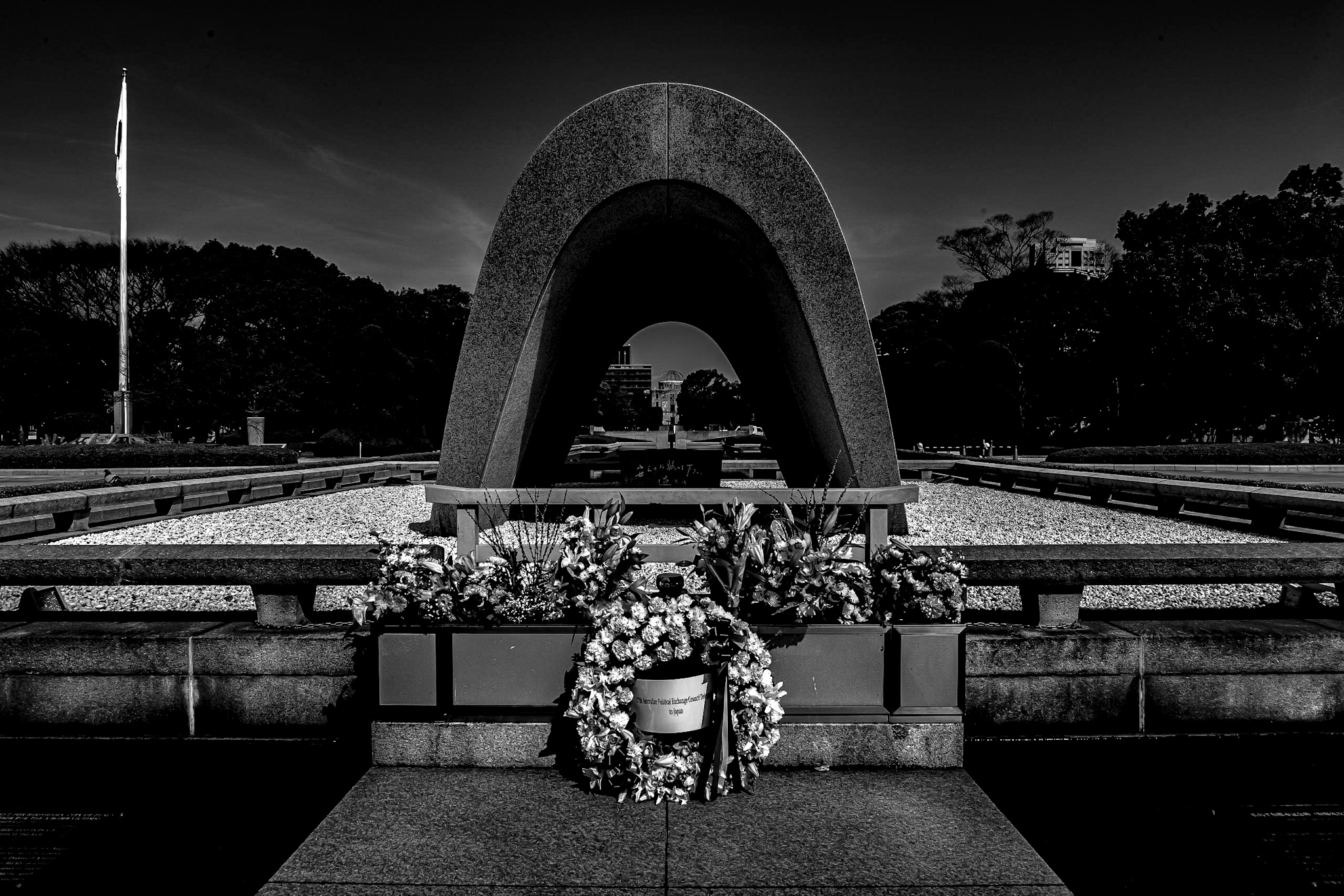 A memorial for all the lives lost due to the bombing sits directly in the middle of Hiroshima's peace park, many flowers and wreaths line the memorial all year round.