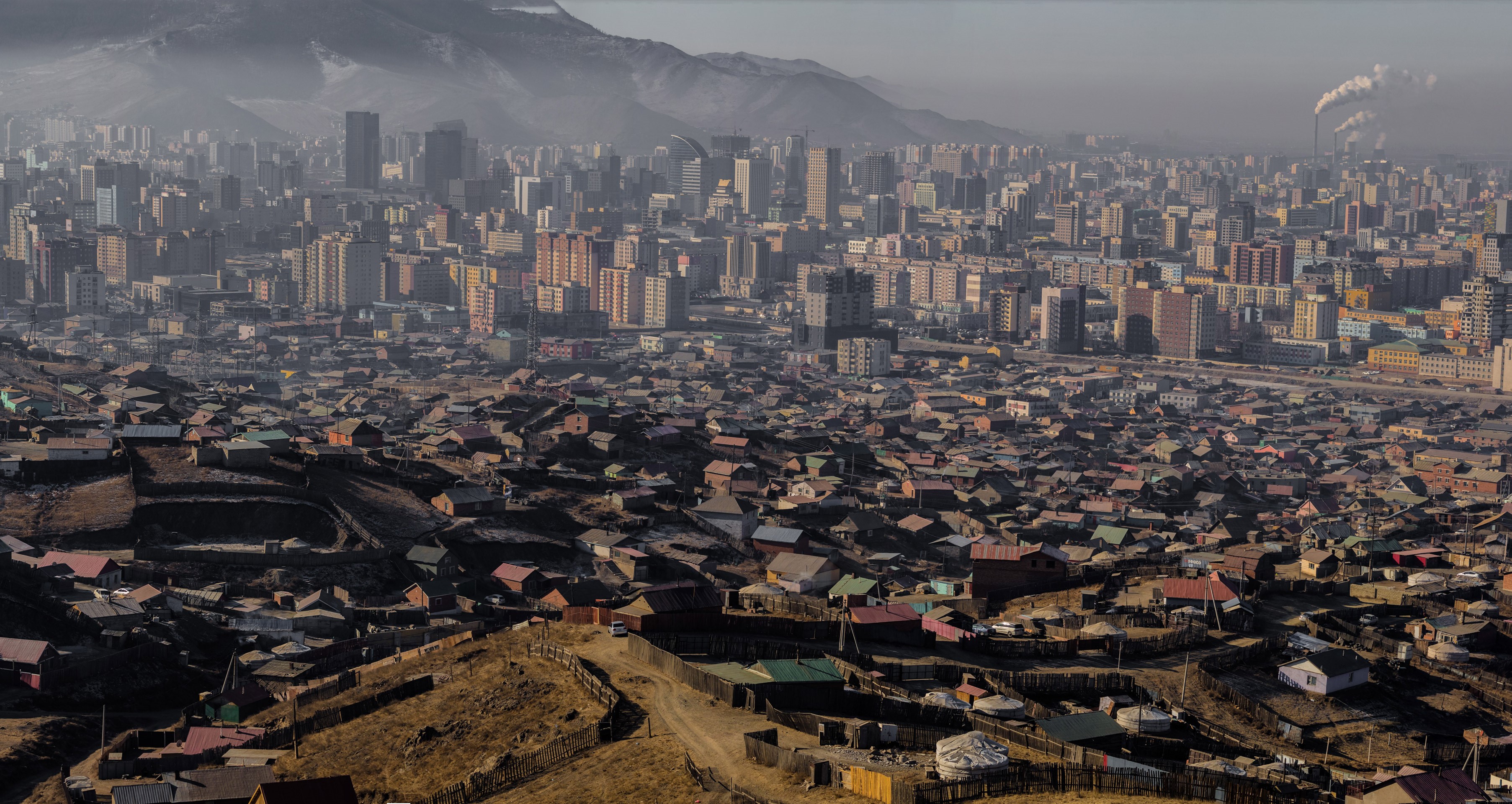 A panoramic view of Ulaanbaatar from a northeastern “ger district,” one of the unplanned communities built during the liberalization and globalization of Mongolia. A quarter of the entire country lives in Ulaanbaatar ger districts, though many dream of moving elsewhere, especially abroad.