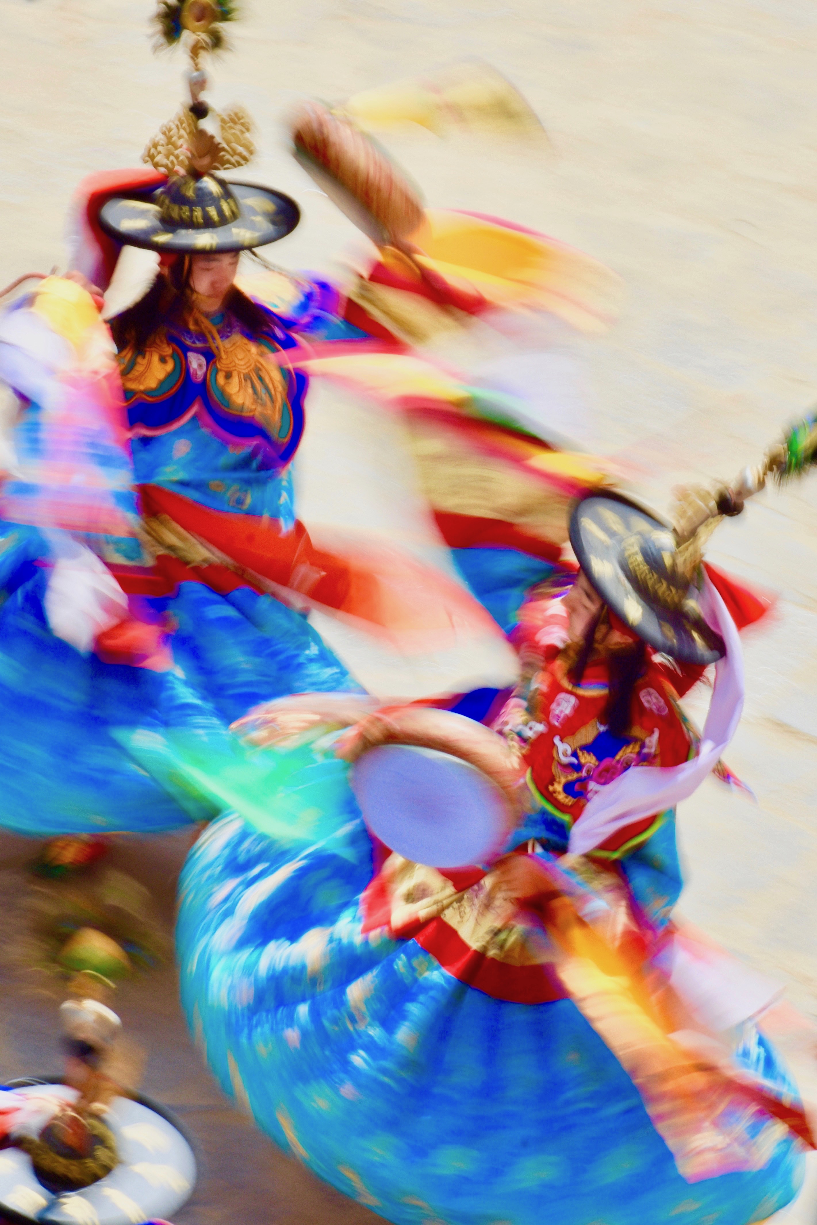Tsechus are a riot of sound and colour, with monks dressed in elaborate costumes of silk and brocade swirling and twirling to the hypnotic rhythm of drums and horns. 