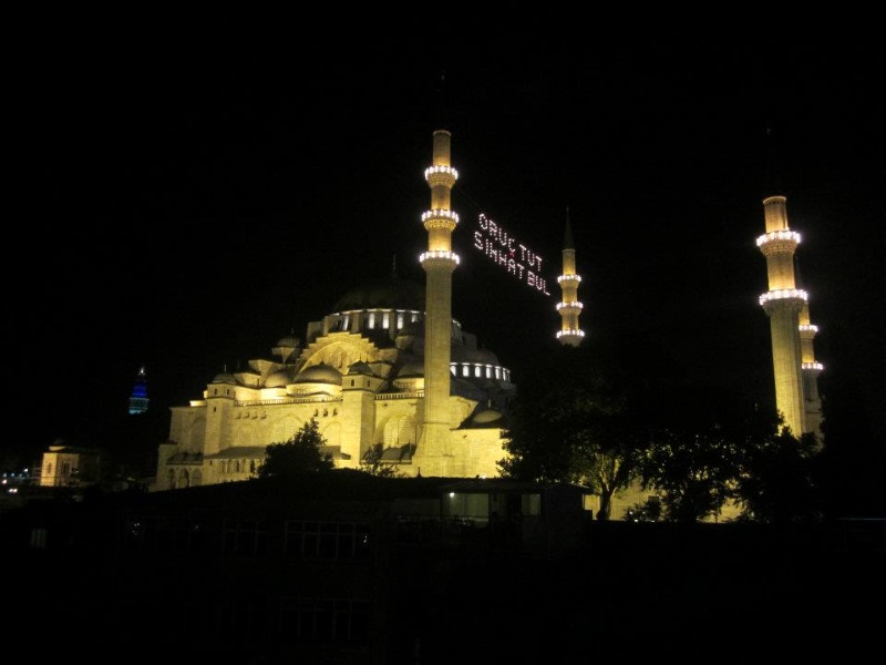 Suleymaniye Mosque, lit up at night.