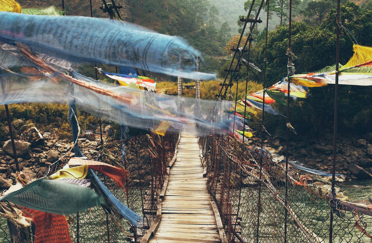 Besides mountain tops, bridges over Bhutan's rivers are most commonly decorated in prayer flags. Every person who crosses these holy waters walks a supremely divine path. 