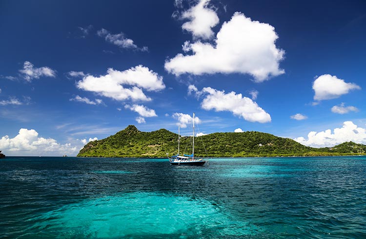 A yacht moored in the sea at Carriacou, Grenada