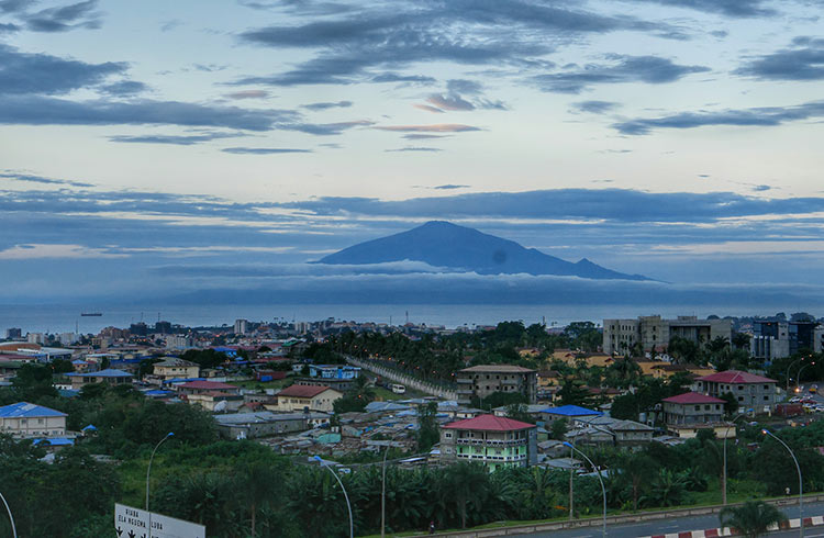 A cityscape of Equatorial Guinea, with an island out to sea