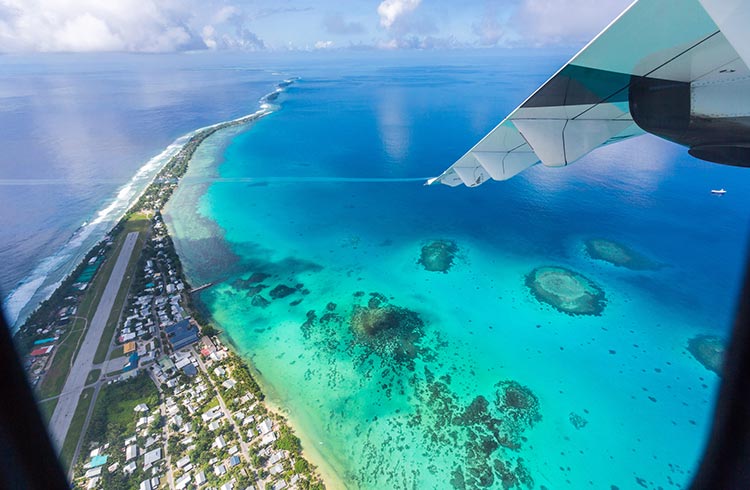 Tuvalu under the wing of an airplane