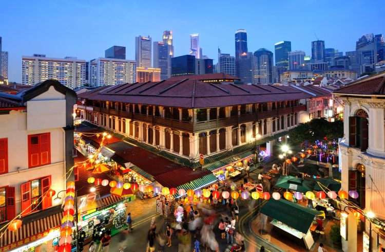 A lively night street scene in Singapore