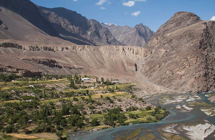 Barchadiev village on the bank of Murghab river in Bartang valley in the Pamirs, Tajikistan