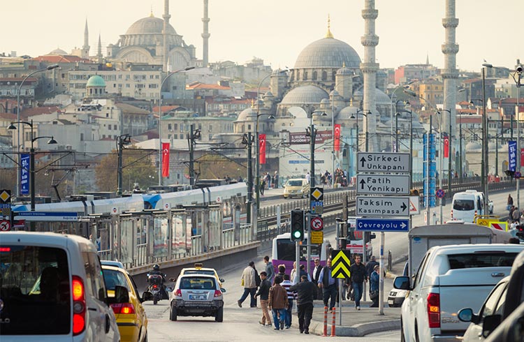 Traffic and pedestrians near on the Galata Bridge over the Golden Horn