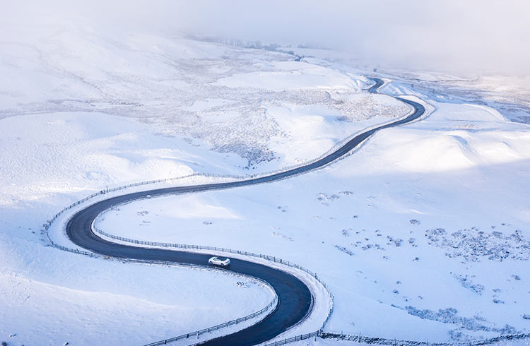 A winding road through snow