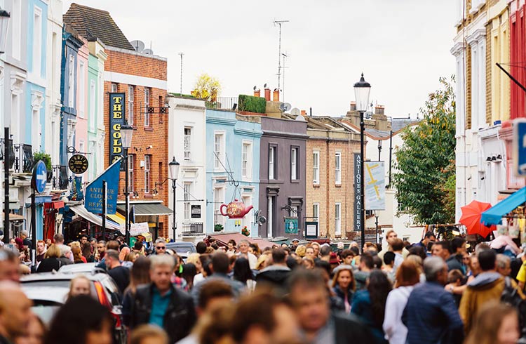 Crowded street at Portobello Road Market in Notting Hill, London