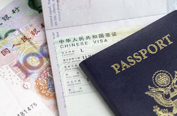 An American passport with a tourist visa for China.