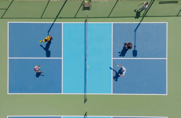 An aerial shot of people playing pickleball