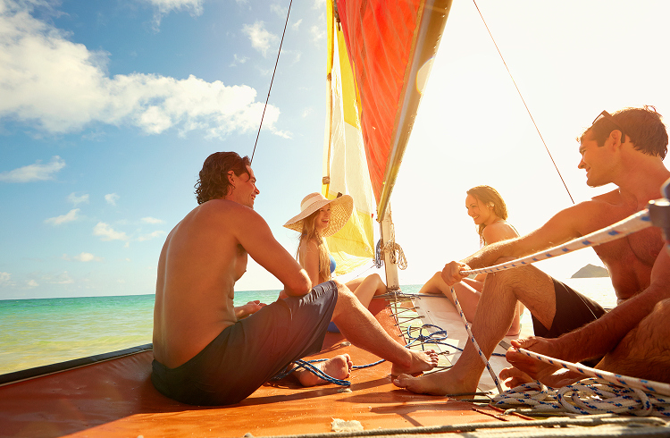 A group of young people sailing