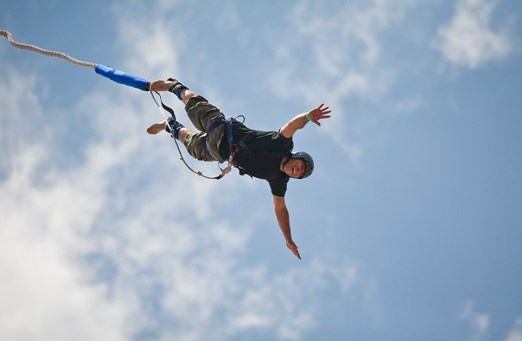 A man bungee jumping
